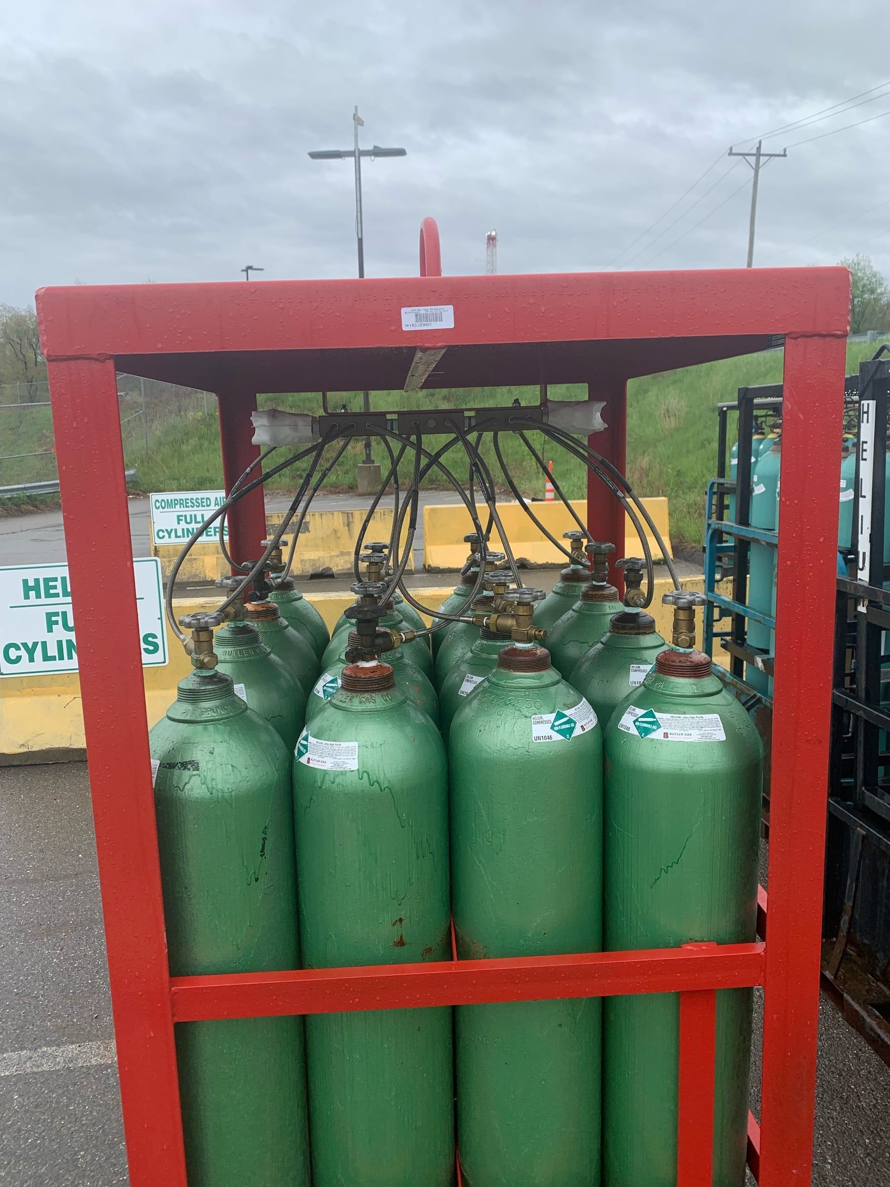 Specialty gas cylinders racked for delivery