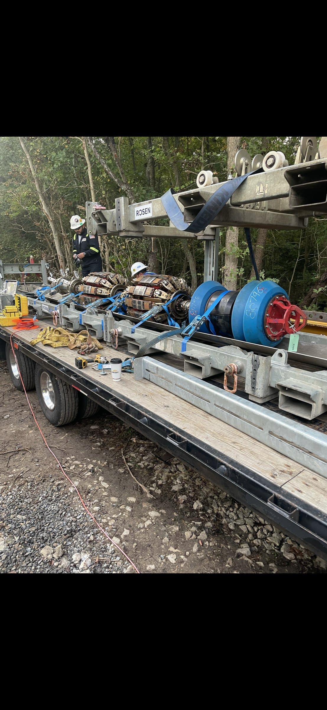 Pipe spool with test fittings loaded on a trailer