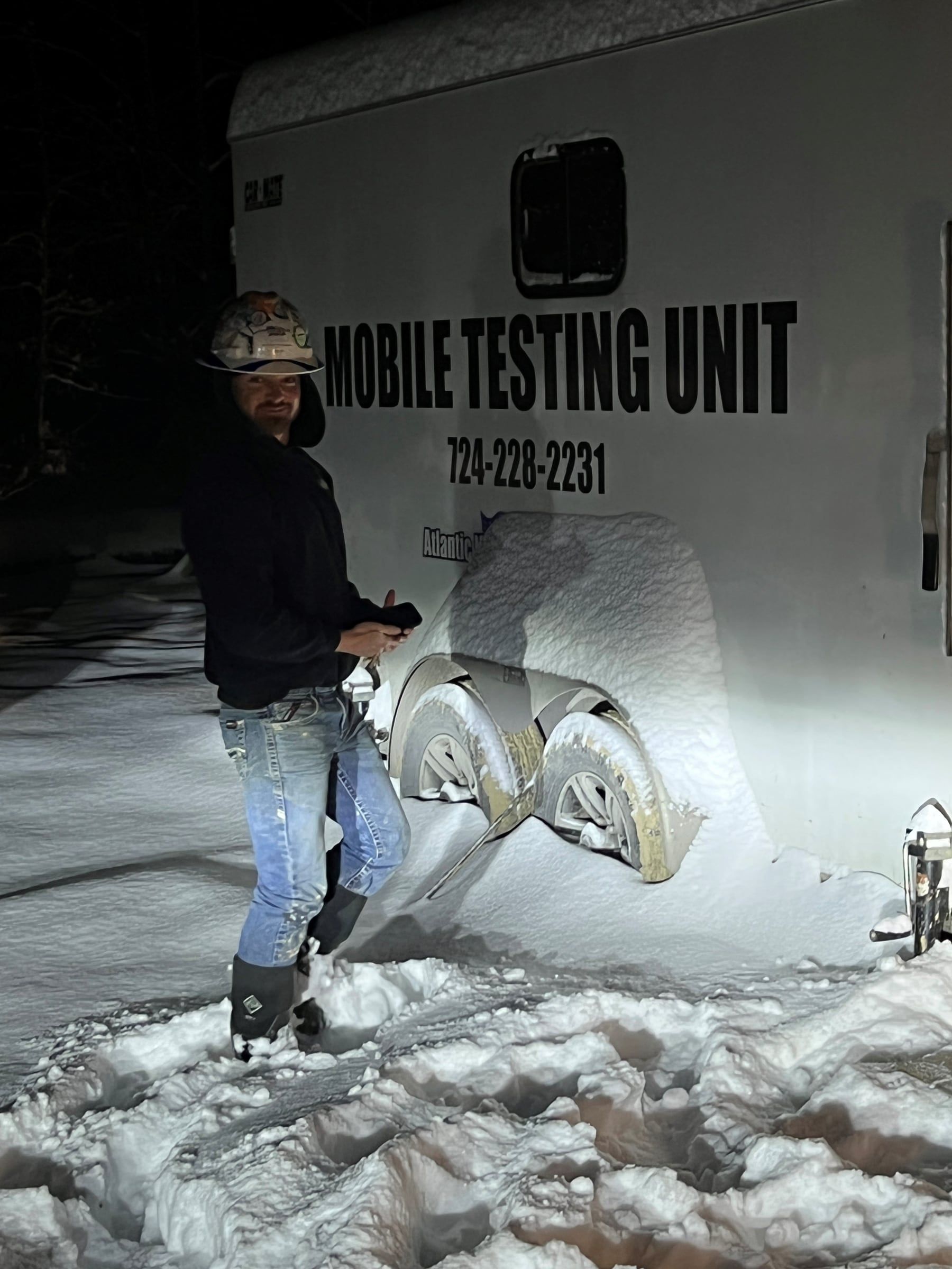 Mobile testing unit working a hydrostatic test in deep snow at St. Marys, Pennsylvania