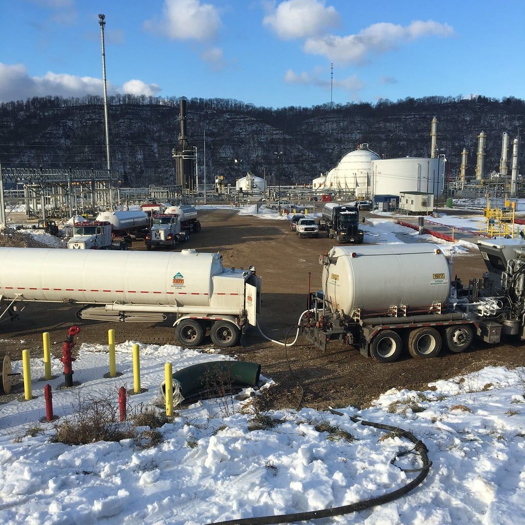 Cryogenic transport supplying a plant across snow covered ground